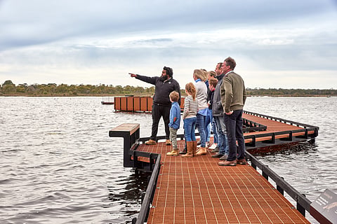 A guide talking about Lake Condah